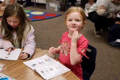 Student smiling at the camera